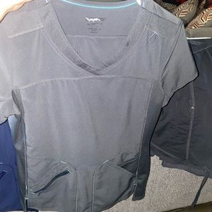 9 sets of matching scrubs